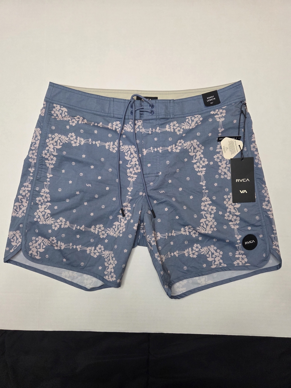 RVCA Blue Boardshorts with Light Pink Floral Pattern